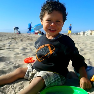 Jacob enjoy the beach, child with Williams Syndrome